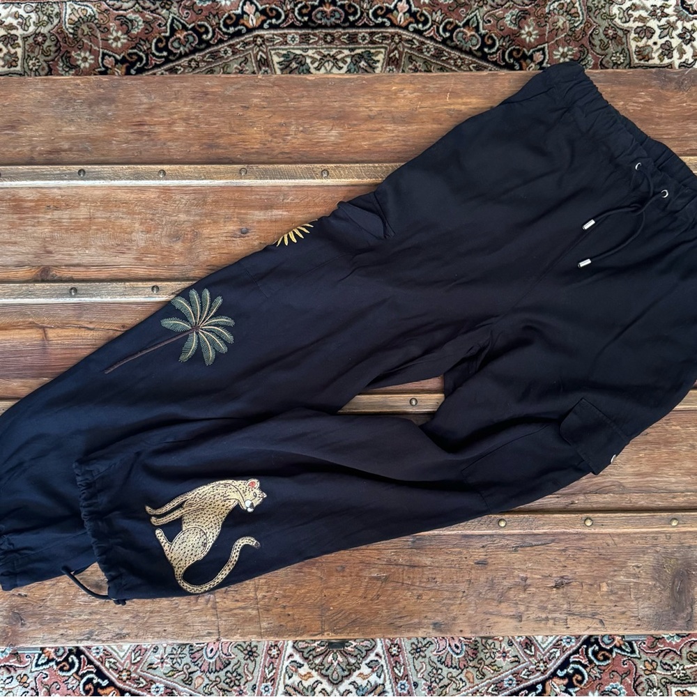 Never Fully Dressed Black Track Joggers with Embroidered Leopard & Palms